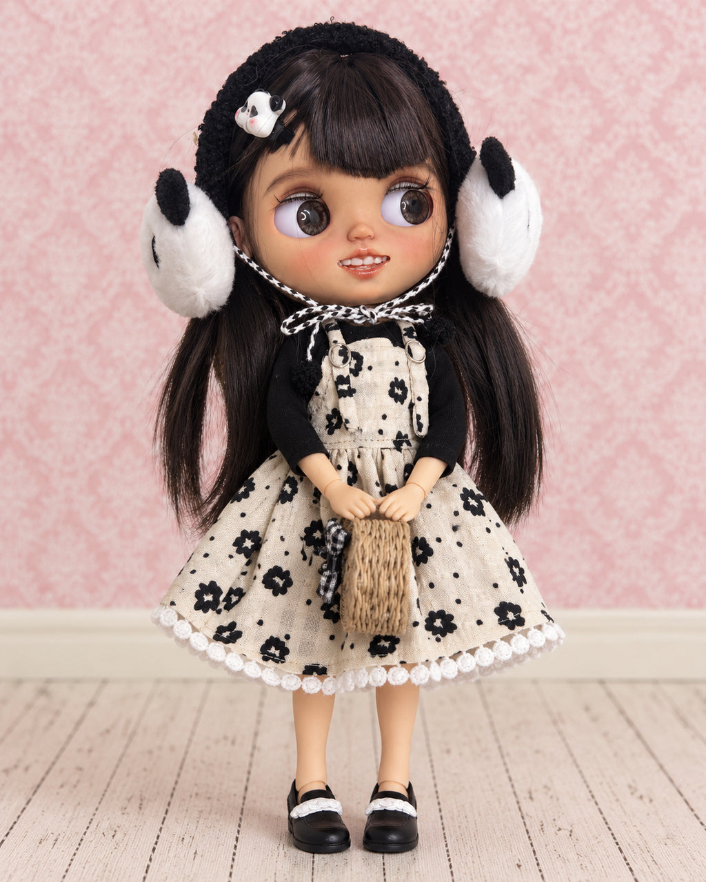 AI-edited presentation image of Pia in a pink miniature studio. Based on real product references; scene furniture and props are not included.