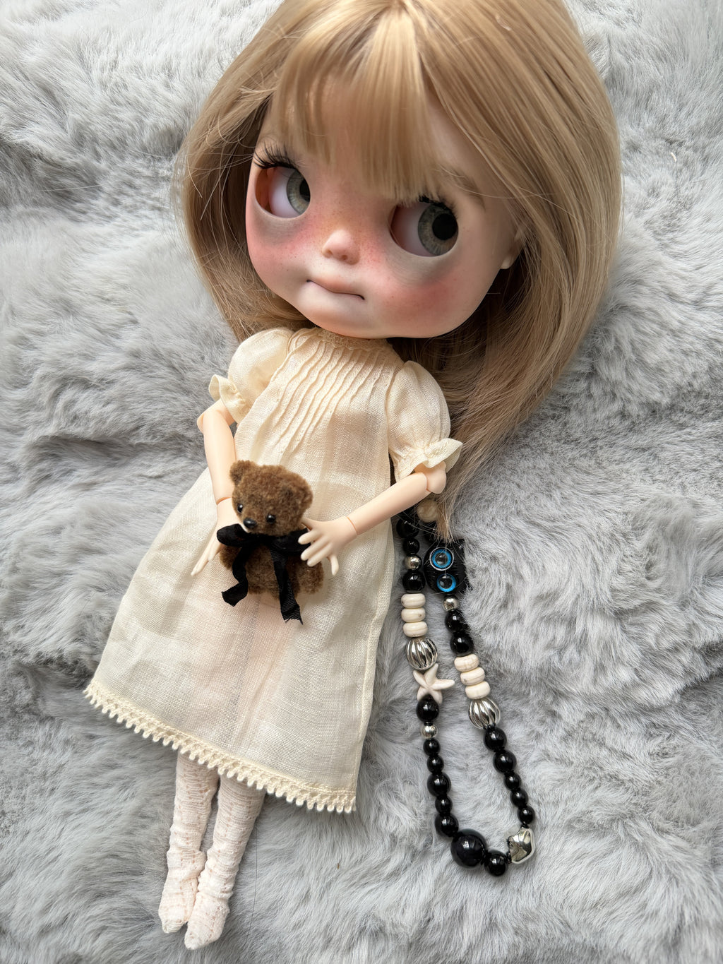 Real product photograph of Nell, view 1, showing the physical customized ICY-DBS Blythe-style doll and its actual outfit and accessories.