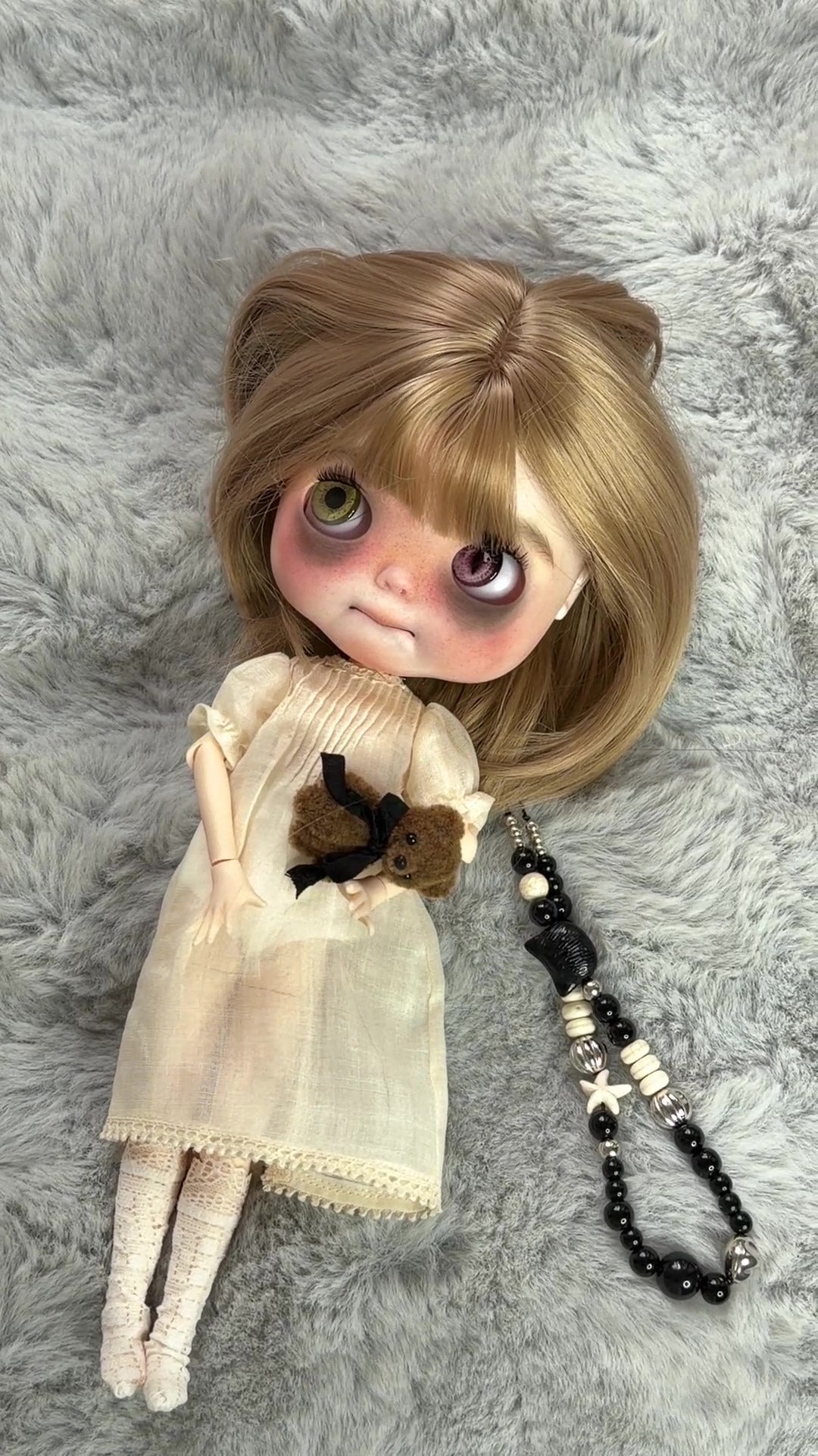 Real product photograph of Nell, view 2, showing the physical customized ICY-DBS Blythe-style doll and its actual outfit and accessories.