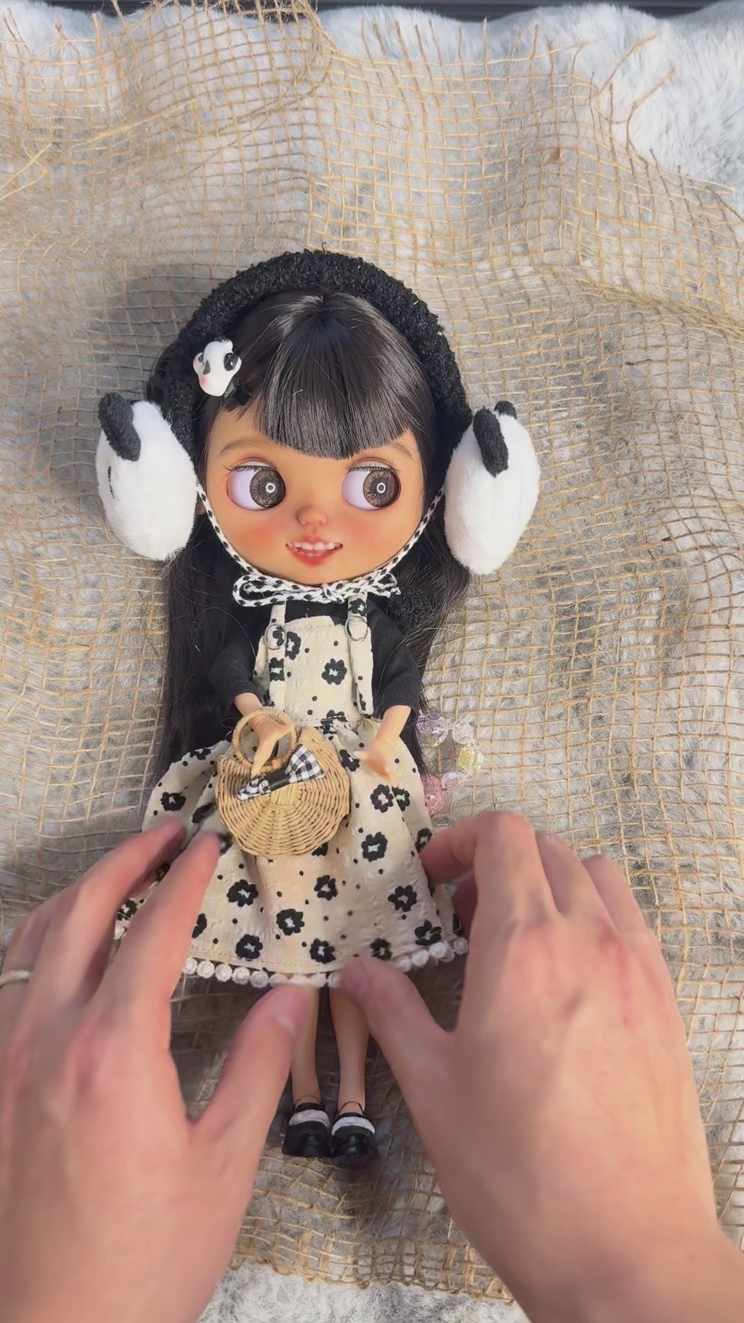 Real product demonstration video of Pia, showing the physical doll, outfit and eye mechanism.